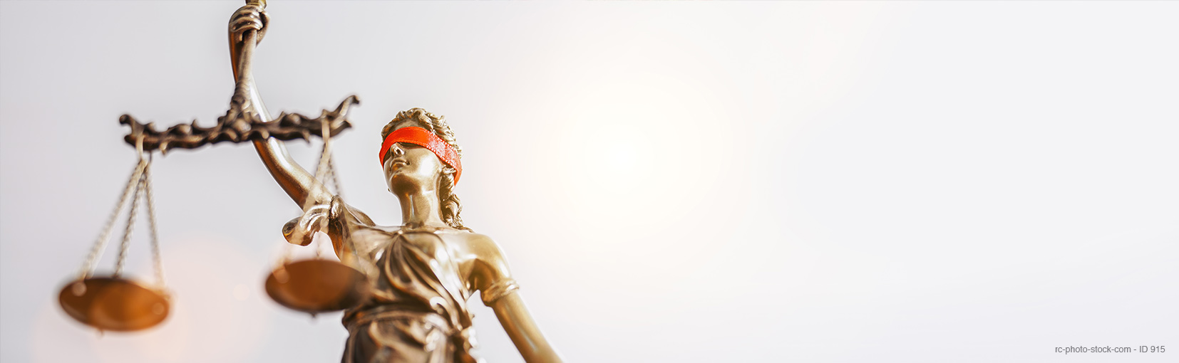 The Statue of Justice - lady justice or Iustitia / Justitia the Roman goddess of Justice with red blindfold, banner size, copyspace for your individual text from ©rcfotostock