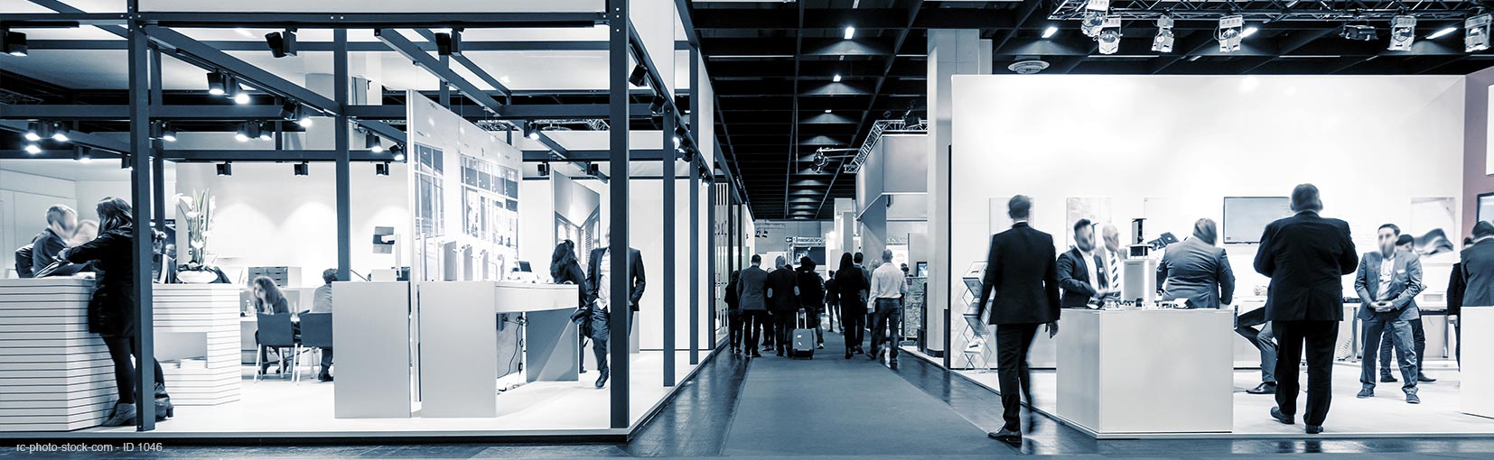 Blurred business people trade fair stands, with copy space, banner size from © rcfotostock